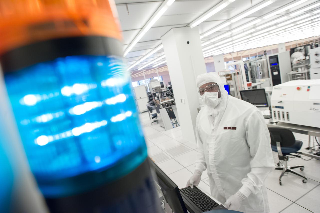 Gary Spinner working on a tool in the 20,000-sq.-ft. Marcus Nanotechnology Building cleanroom.