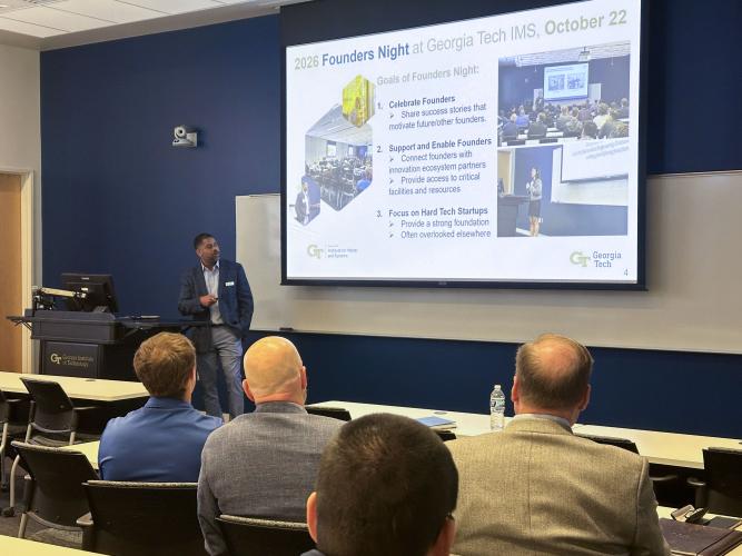 Billyde Brown addresses attendees beneath a slide outlining goals for 2026 Founders Night at Georgia Tech IMS, including celebrating, supporting, and enabling founders.