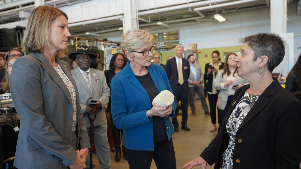U.S. Secretary of Energy Jennifer Granholm (center) is brought up to date by Georgia Tech&#039;s Krista Walton (left) and Jennifer Hirsch (right) during a 2024 visit to campus.