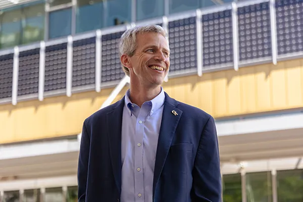 Tim Lieuwen standing outside the CNES Building on the Georgia Tech campus.